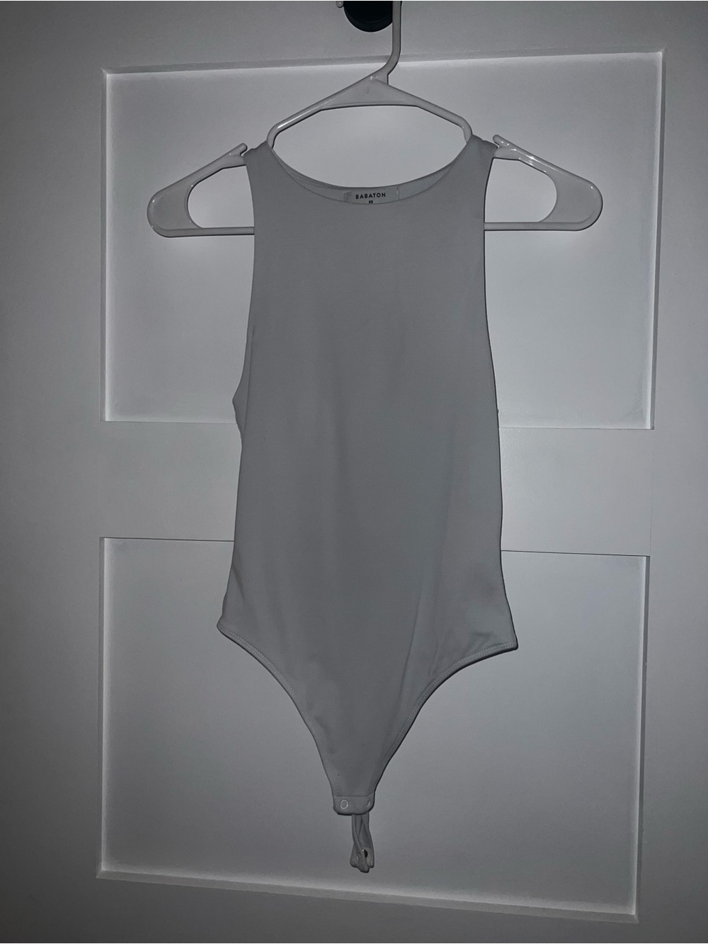 Aritzia Babaton Sleeveless White One-Piece Bodysuit